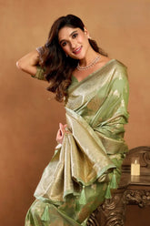 India Silk Mint Green Sarees Showcase A Rich Pallu Adorned With Intricate Zhallar Work Blending Traditional Craftsmanship